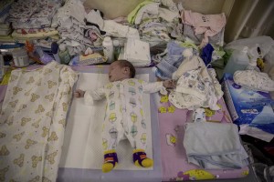 Nurses look after surrogate-born babies inside a special shelter owned by BioTexCom clinic in a residential basement, as Russia’s invasion continues, on the outskirts of Kyiv, Ukraine on March 19, 2022.