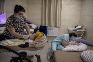 Nurses look after surrogate-born babies inside a special shelter owned by BioTexCom clinic in a residential basement, as Russia’s invasion continues, on the outskirts of Kyiv, Ukraine on March 19, 2022.