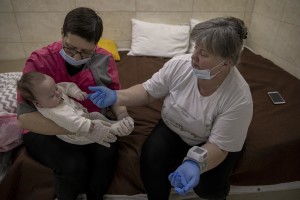 Nurses look after surrogate-born babies inside a special shelter owned by BioTexCom clinic in a residential basement, as Russia’s invasion continues, on the outskirts of Kyiv, Ukraine on March 19, 2022.