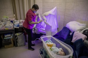 Nurses look after surrogate-born babies inside a special shelter owned by BioTexCom clinic in a residential basement, as Russia’s invasion continues, on the outskirts of Kyiv, Ukraine on March 19, 2022.