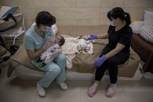 Nurses look after surrogate-born babies inside a special shelter owned by BioTexCom clinic in a residential basement, as Russia’s invasion continues, on the outskirts of Kyiv, Ukraine on March 19, 2022.