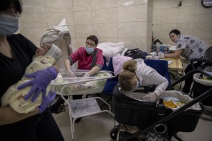 Nurses look after surrogate-born babies inside a special shelter owned by BioTexCom clinic in a residential basement, as Russia’s invasion continues, on the outskirts of Kyiv, Ukraine on March 19, 2022.
