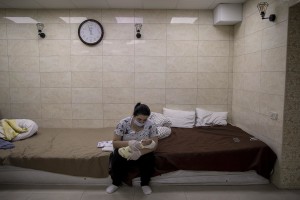 Nurses look after surrogate-born babies inside a special shelter owned by BioTexCom clinic in a residential basement, as Russia’s invasion continues, on the outskirts of Kyiv, Ukraine on March 19, 2022.