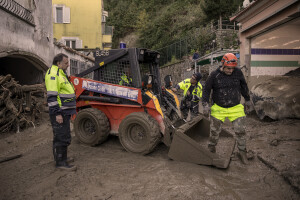 Civil protection operators at work to remove mud from the street following a landslide hit the Italian holiday island of Ischia, Southern Italy on November 27, 2022.