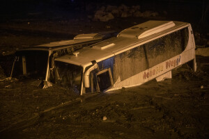 Damaged bus and debris pile up on the beach following a landslide on the Italian holiday island of Ischia, Southern Italy on November 26, 2022.