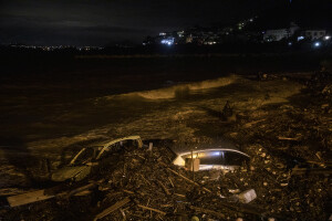 Destroyed cars pile up on the beach following a landslide on the Italian holiday island of Ischia, Southern Italy on November 26, 2022.
