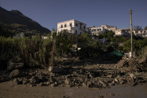 A road covered in mud the day after a landslide hit the Italian holiday island of Ischia, Southern Italy on November 27, 2022.