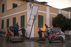 Volunteers are seen in the street the day after a landslide hit the Italian holiday island of Ischia, Southern Italy on November 27, 2022.