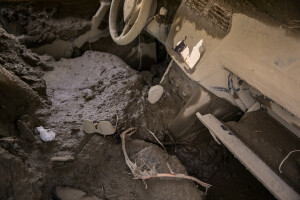 The interior of a car covered in mud the day after a landslide hit the Italian holiday island of Ischia, Southern Italy on November 27, 2022.