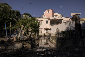 The entrance of a house covered in mud the day after a landslide hit the Italian holiday island of Ischia, Southern Italy on November 27, 2022.