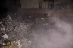 A worker searches for lifeless bodies in the rubble of a building in Kahramanmaras, Turkey on February 18, 2023. On February 6, 2023 a powerful earthquake measuring 7.8 struck southern Turkey killing more than 50,000 people.