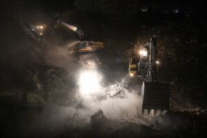 Excavators at work in the rubble of collapsed buildings in Kahramanmaras, Turkey on February 13, 2023. On February 6, 2023 a powerful earthquake measuring 7.8 struck southern Turkey killing more than 50,000 people.