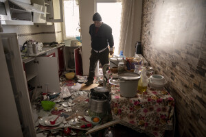 A man walks into the kitchen of his apartment in Kahramanmaras, Turkey on February 13, 2023. On February 6, 2023 a powerful earthquake measuring 7.8 struck southern Turkey killing more than 50,000 people.