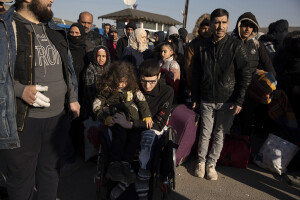 Syrian people effected by the earthquake are seen before crossing from Turkey’s Cilvegozu border crossing to Syria’s Bab al_Hawa border crossing in Reyhanli, Turkey on February 17, 2023. Following the earthquake that struck southern Turkey on February 6, 2023 killing more than 50,000 people, thousands of Syrian refugees living in Turkey decided to return to their country of origin.