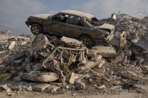 A destroyed car is seen on the rubble of a building in Hatay, Turkey on February 12, 2023. On February 6, 2023 a powerful earthquake measuring 7.8 struck southern Turkey killing more than 50,000 people.