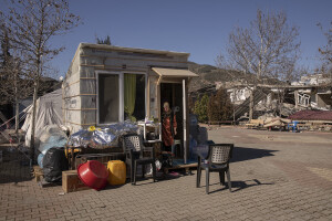 A woman is seen inside a shelter in Beyoglu, near Kahramanmaras, Turkey on February 16, 2023.