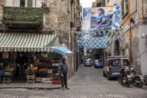 A fruit and vegetable shop near a streets decorated in blue to celebrate the victory of Napoli’s third championship in Sanità district in Naples, Southern Italy on April 6, 2023.