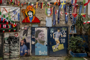 Posters and murals depicting the Argentine soccer legend Diego Armando Maradona are seen in the Spanish Quarter in Naples, Southern Italy on November 23, 2021. Diego Armando Maradona died on November 25 of last year and next November 25, 2021 will be the anniversary of his death.