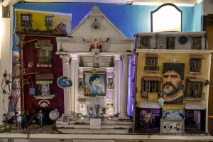 An altar dedicated to the Argentine soccer legend Diego Armando Maradona is seen inside a bar of the historical center of Naples, Southern Italy on November 23, 2021. Diego Armando Maradona died on November 25 of last year and next November 25, 2021 will be the anniversary of his death.