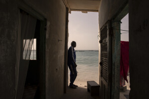 Djibrilwade, 56 years old is seen inside his house facing the sea built by his father in the 1990s in Bargny, Senegal on December 16, 2023. Two or three times a year it happens that sea water reaches inside the house. The coastal erosion began in the 1980s but worsened in the early 2000s. Storm surges have become more common and fiercer, like the passage of Hurricane Fred in the night of August 30, 2015. Bargny is currently losing three to four meters of coast each year.