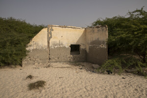 The remains of a house destroyed by the sea waves in the Doune Baba Dieye village in Saint-Louis, Senegal on December 12, 2023. Doune Baba Dieye was once a vibrant fishing community, but changing weather patterns and heavy rainfall in 2003 led to flooding inland and a rise in sea levels that have now destroyed many houses and submerged part of the village which today can only be reached by boats.
