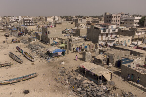 A general view of the “Langue de Barbarie” in Saint-Louis, Senegal on December 14, 2023. The “Langue de Barbarie” is a thin, sandy peninsula located in western Senegal, where around 80,000 people live and is among the places most threatened by the rise in sea levels generated by climate change. The peninsula separates the Atlantic ocean from the final section of the Senegal river.