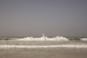 A general view of the sea in the “Langue de Barbarie” in Saint-Louis, Senegal on December 14, 2023. The “Langue de Barbarie” is a thin, sandy peninsula located in western Senegal, where around 80,000 people live and is among the places most threatened by the rise in sea levels generated by climate change. The peninsula separates the Atlantic ocean from the final section of the Senegal river.