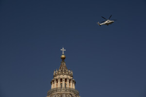 A helicopter flies over the Vatican before the funeral of Pope Francis at the Saint Peter’s square in Rome, Italy on April 26, 2025.